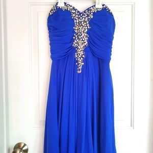 A knee length strapless blue dress